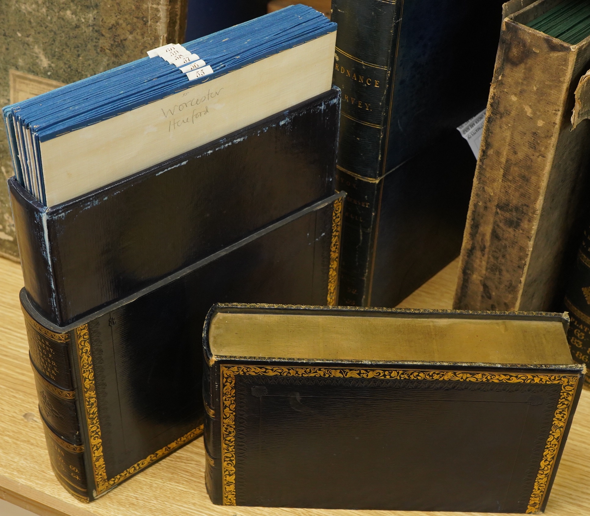 Ordnance Survey maps, comprising of a set of seven engraved maps mounted on linen and each edged with blue cotton, covering Cardigan, Montgomery, S. Salop, S. Stafford, N. Warwick, Leicester, and Rutland, sheet no.s; 55,